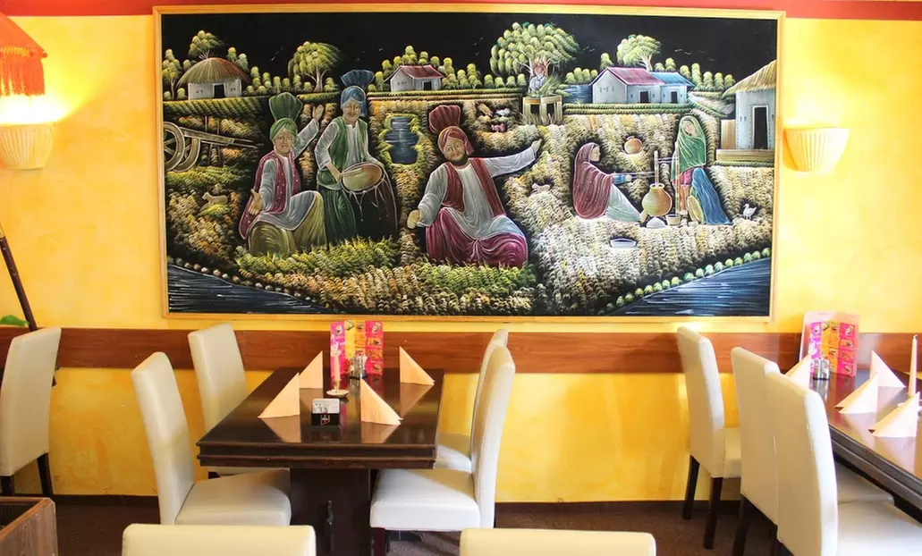 Indian 3-course menu including aperitif for 2 or 4 people at Aanjal Indian Restaurant (save 34%)